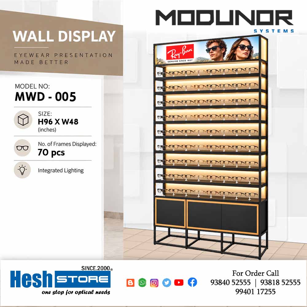 Black and gold illuminated optical wall display cabinet with multiple eyewear shelves, branded header and bottom storage panels, model MWD-005.