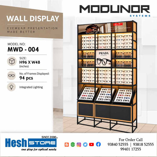 Black and gold optical showroom display unit with three vertical sections, illuminated shelves, angled eyewear trays and bottom storage panels, model 